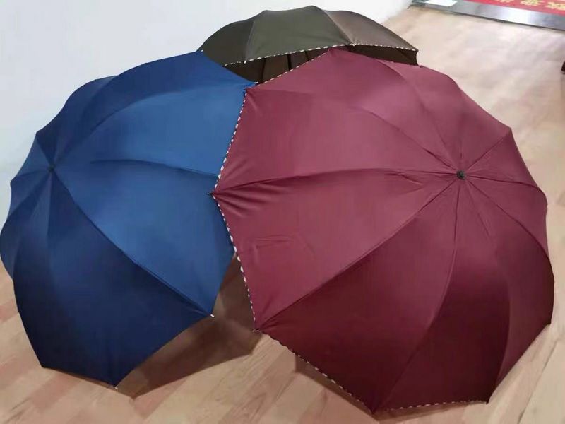 全遮光碰击黑胶绣花二折晴雨伞
